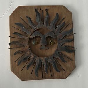 Vintage MCM metal sun face wall sculpture on a wooden plaque Wall Art